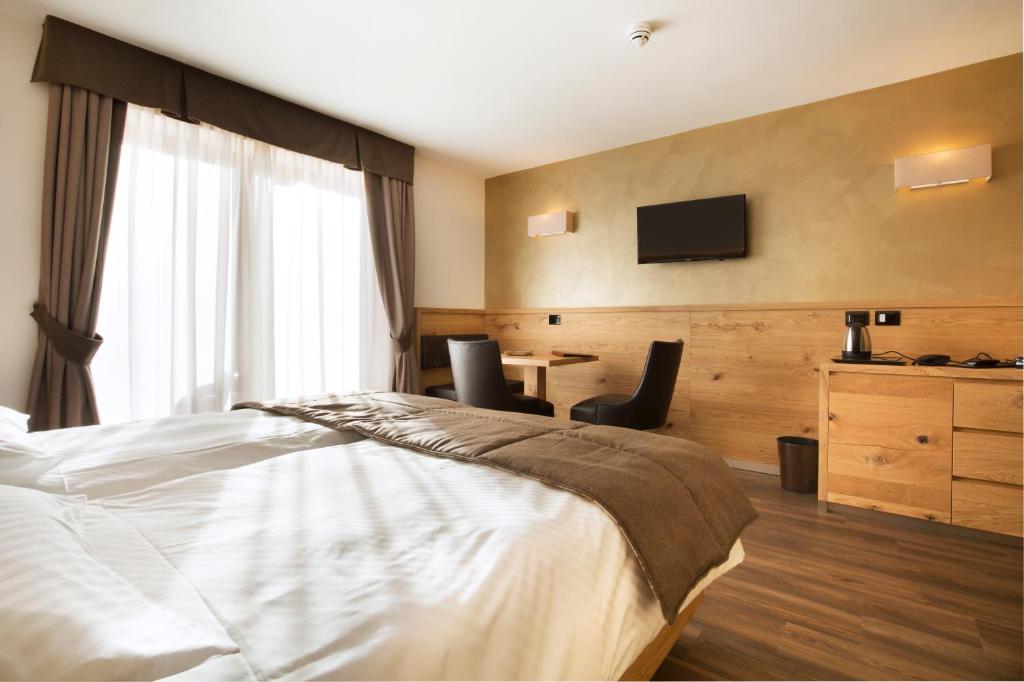 hotel chalet marcora campitello di fassa dolomiten bed