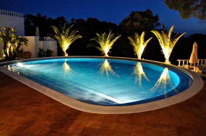 hotel village cala vadella ibiza pool at night