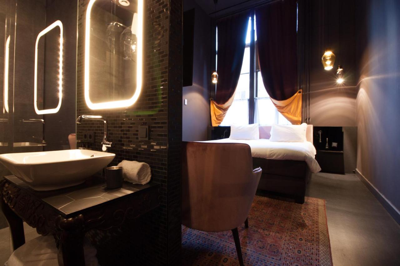 hotel boutiquehotel staats haarlem room and bathroom